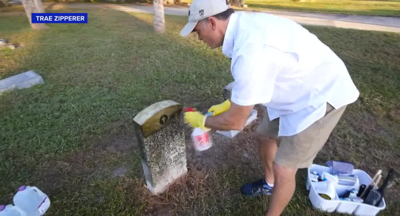 ./.Man honors veterans by cleaning their headstones